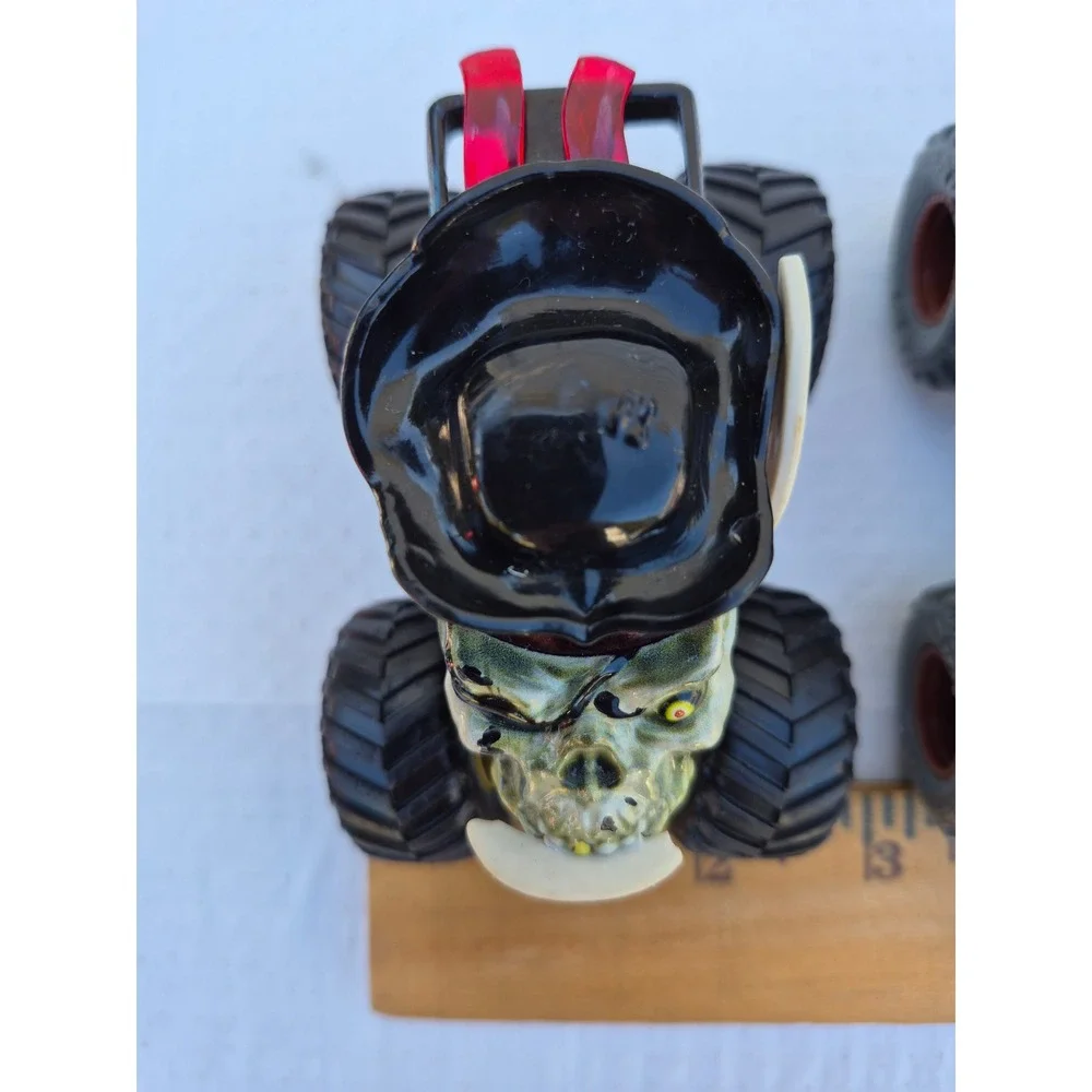 Monster Jam Pirates Curse and Zombie vs Hunter Earth Shaker Die-Cast Truck Lot